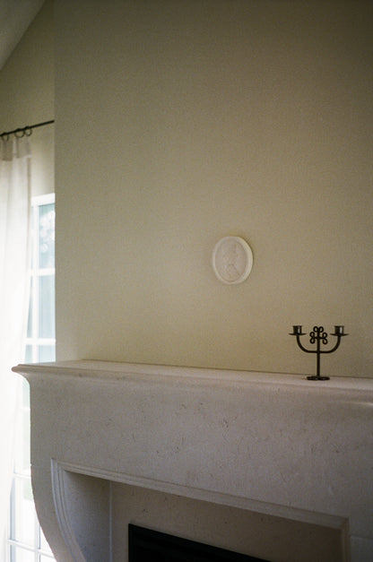 Elio Relief in Round 2 -round 2-plaster