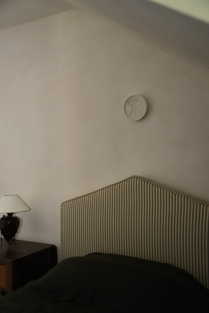 Elio Relief in Round 1 -round 1-limewash